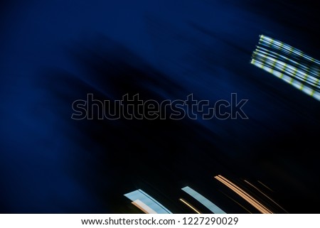 Long exposure photograph of moving lights.Abstract light effect on a black background. 