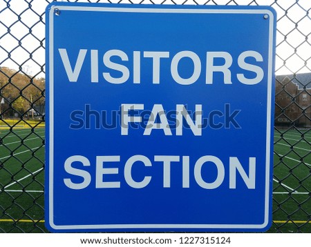 Football stadium visitors section sign 
