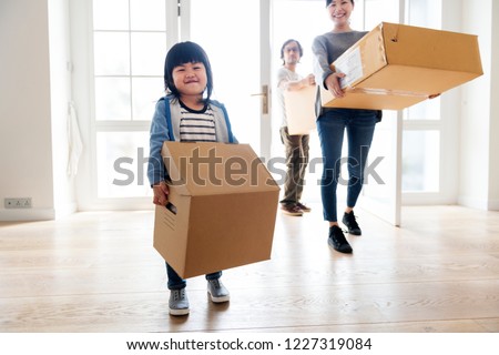 Asian family emoving to new house
