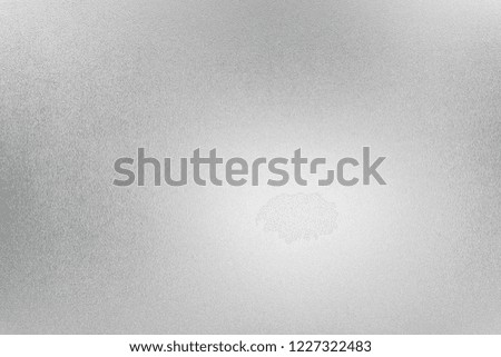Silver texture foil metal background. Shine holiday light paper shine.