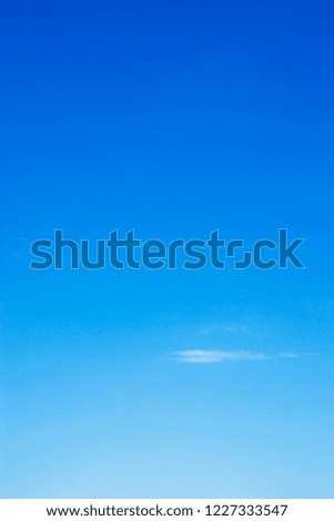 Soft white clouds against blue sky background and copy space.