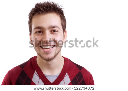 Young man smiling isolated on white background