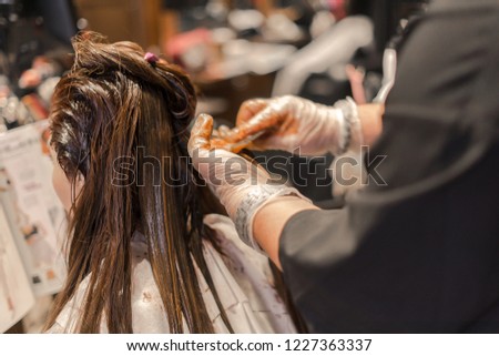 Female hair salon. Beauty. Hairdresser. Warm tone. Royalty-Free Stock Photo #1227363337