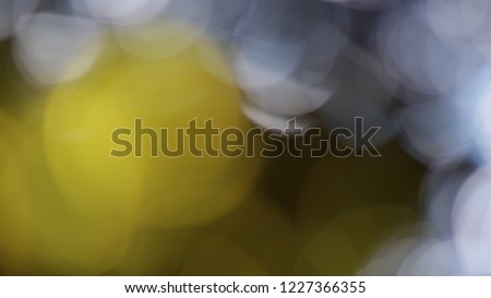 White and gold yellow bokeh blurry background
