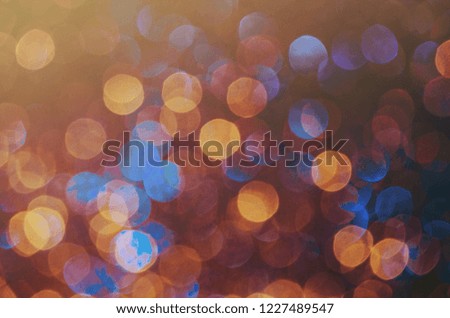 Blue and orange holiday bokeh. Abstract Christmas background