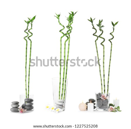 Set with bamboo and spa stones on white background