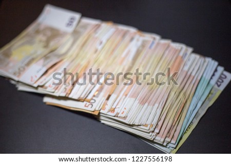 Many different euro banknotes in cash close-up
