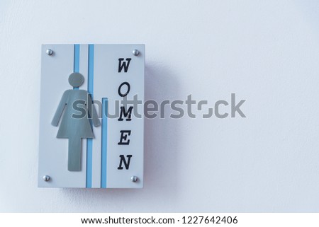 Toilet signs to show room for women.  