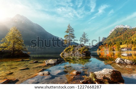 Awesome Sunny nature landscape. Impressively beautiful Hintersee lake at sunrise. best popular location for photographer in World. view of German Alps, Bavarya, Europe. Natural Background for postcard
