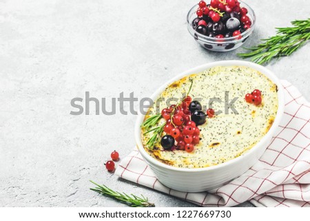 Cottage cheese poppy seed and berries bake. Selective focus, space for text.