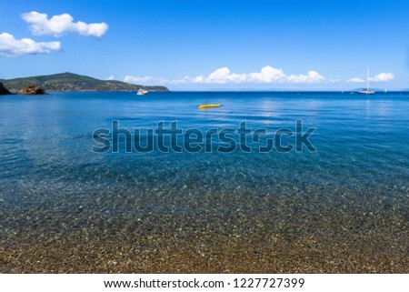 Blue sea with white clouds