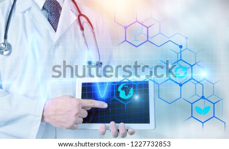Medicine doctor and stethoscope using tablet with icon medical network connection on virtual screen interface in hospital background. Modern medical technology concept.