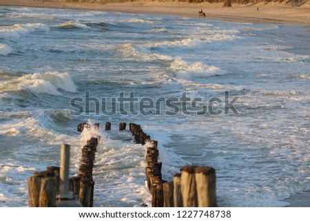 Beautiful pictures of a stormy sea on a beautiful autumn day in Westkapelle