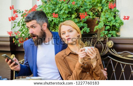 Couple in love sit cafe terrace enjoy coffee while man speak phone. Girl dating with businessman. Things know before you date entrepreneur businessman. Find and date businessman. Dating businessman.