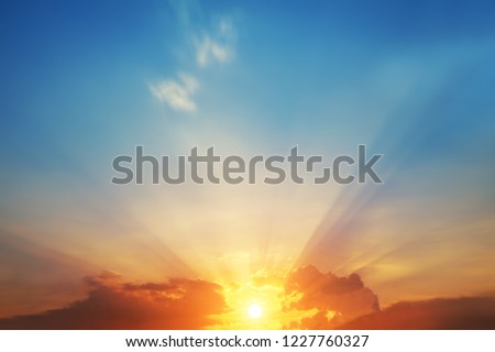 The blur pastels gradient sunset background on soft nature sunrise peaceful morning beach outdoor. heavenly mind view at a resort deck touching sunshine, sky summer clouds.