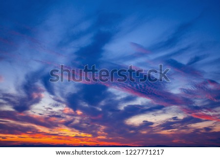 Picturesque dramatic colorful vibrant sunset sky with clouds.