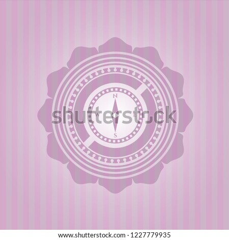 compass icon inside pink icon or emblem