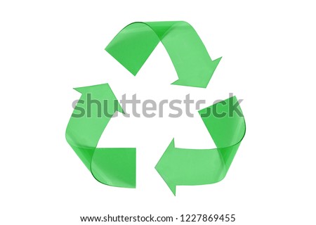 Recyclig symbol made of green plastic on white background