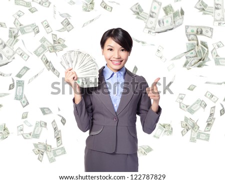 business woman with handful of money giving thumbs up with money rain, asian beauty model