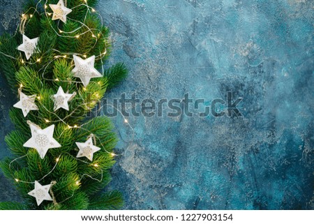 Christmas decoration on blue background.