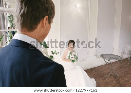 Bride and groom in the hall