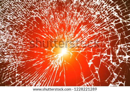 broken smartphone, close-up of broken glass, broken screen on a black background