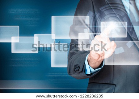 Business man working with a virtual screen. Business, technology and internet concepts