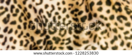 Defocused background of a fabric texture. Intentionally blurred post production for bokeh effect