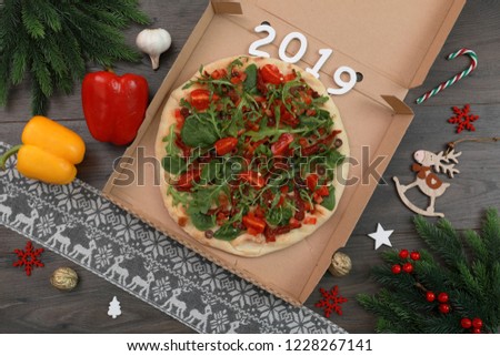 Christmas decoration. Health food pizza background decoration.