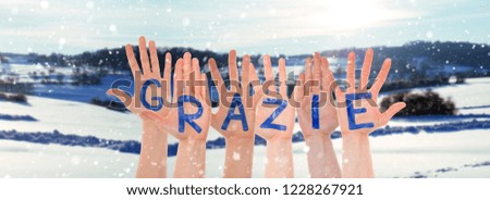 Many Hands Building Granzie Means Thank You, Winter Scenery As Background
