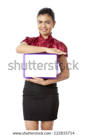 Close-up image of a cheerful lady holding a white slate board isolated on a white background