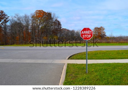 Stop sign in both English and French, with room for copy. Ideal for international driving instruction guides, posters, safety and awareness print media, with room for copy.