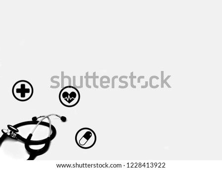 Stethoscope on white background with symbol of hospital, heart rate and medicine. Health checking, health care concept. 
