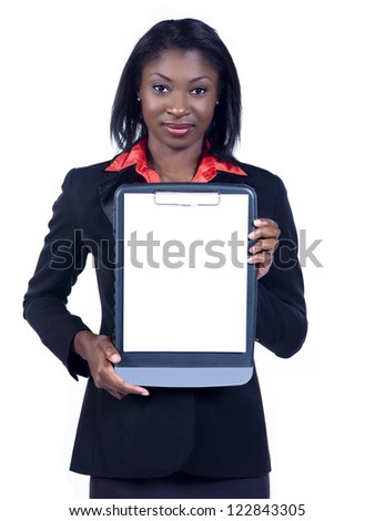 Portrait of a smiling young African American businesswoman holing clipboard