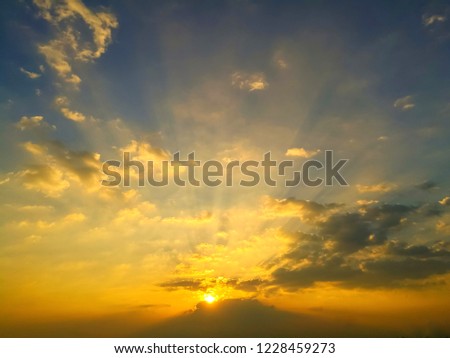 Colorful twilight sky background. abstract sun beam line light shining through the clouds. Sunbeam through the clouds haze on Beautiful sky