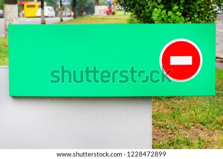 The road sign of Do not enter on a on light green background. The concept the entrance is forbidden. Copyspace