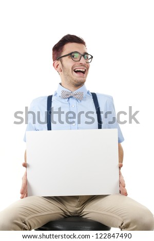 Young nerd man holding white panel