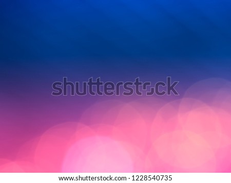 Dramatic bottom aligned pink and blue bokeh background