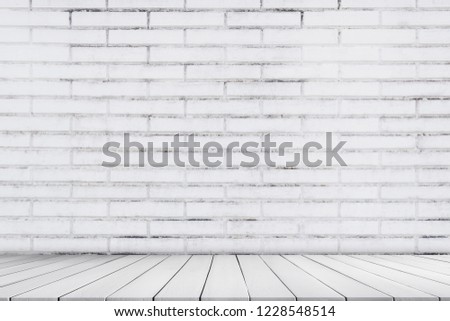 Empty grunge gray brick wall background and gray wood floor perspective interiors of room,well use as editing for display product or text present on free background