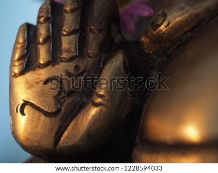 Ganeshas Hand with OM sign inside, deity of hinduism belief,