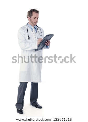 Full length of a young doctor making a report over white background