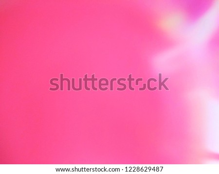 Abstract out of focus lights coming from the Closeup of Colorful Glass Globe. The Depiction of Infrared radiation of Galactic space and Universe after Big Bang. Abstract background of Red,Yellow, Blue
