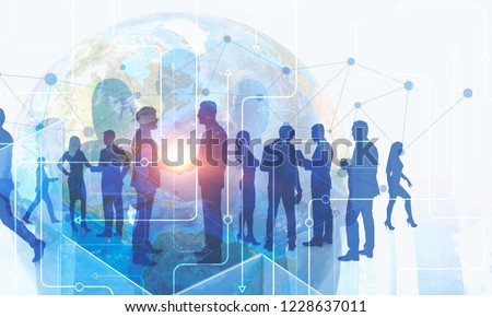 Silhouettes of business people over Earth hologram and immersive interface. Concept of international business. Toned image double exposure Elements of this image furnished by NASA