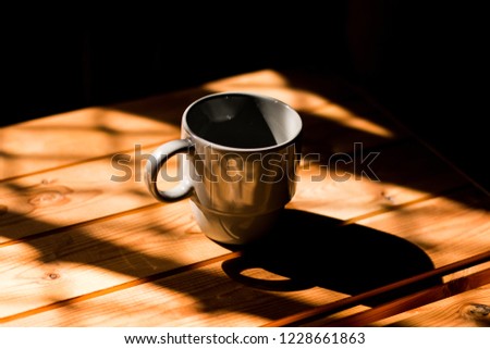 Coffee mug on a wooden table 