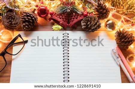 Christmas background with decorations placed on a wooden table a