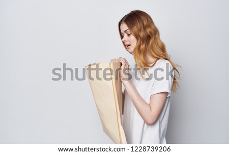 woman with package in hand                   