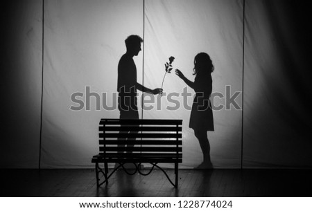 Silhouette of young couple in love 