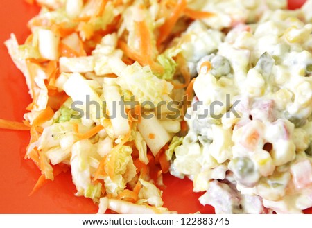 fresh vegetables salad with cabbage and carrot.