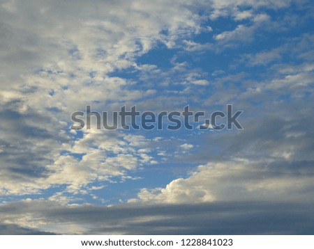 Clouds and blue sky are used as backgrounds.