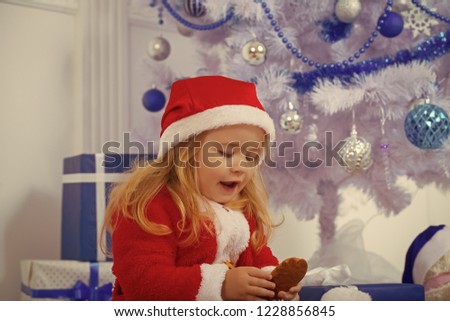 Winter holiday and vacation. Xmas party celebration. Santa claus kid with present box, black Friday. New year small boy at Christmas tree. Christmas happy child with bear and gift, cyber monday.